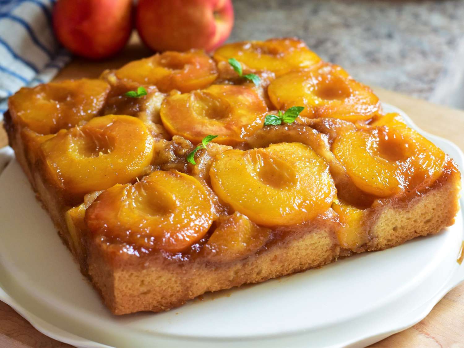 Recipe Peach Upside Down Cake I Peach-Uside-Down-Cake-Kim-4x3-1-2000-be83eba59e944907abfaa26c86afa986